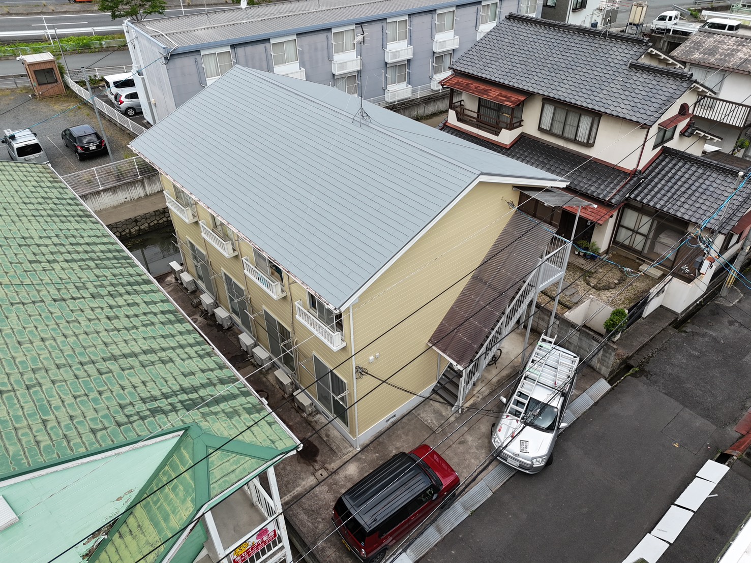 岡山市北区｜屋根塗装工事・外壁塗装工事・コーキング打ち替え・通路長尺シート張り工事｜2026/07/3